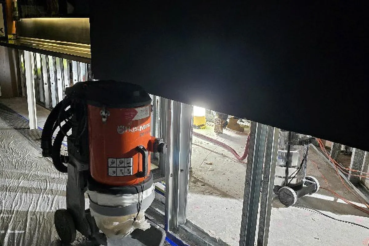 Exposed ceiling framing and services during reinstatement