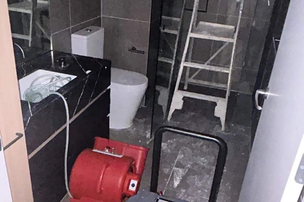 Air mover drying an affected bathroom during works