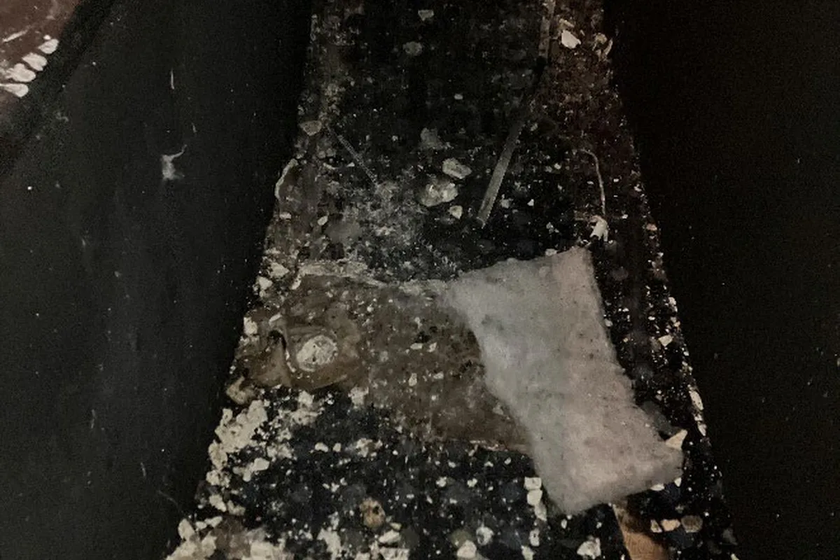 Soot and debris across the affected cinema flooring