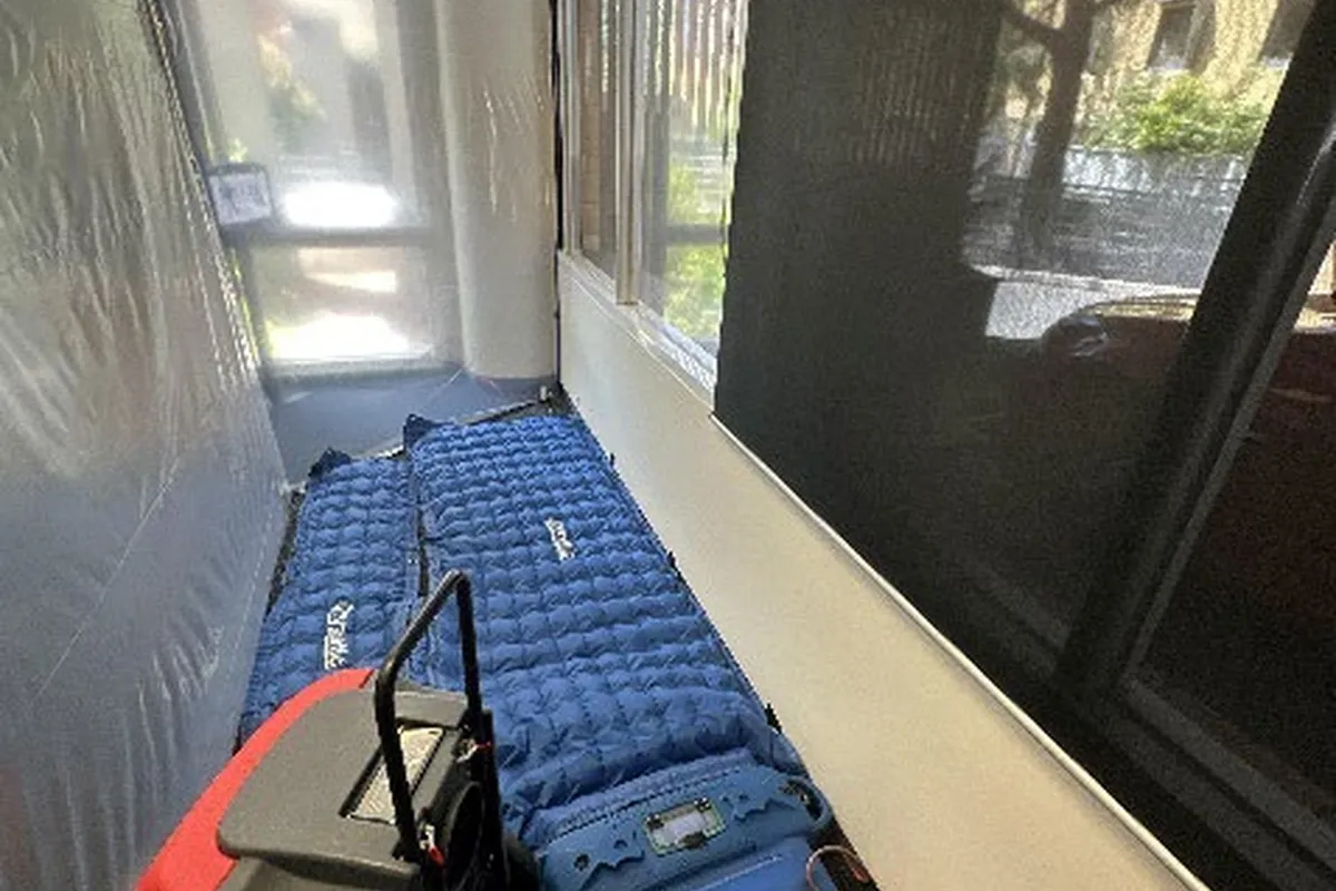 Air movers and dehumidification set up beside the clinical windows