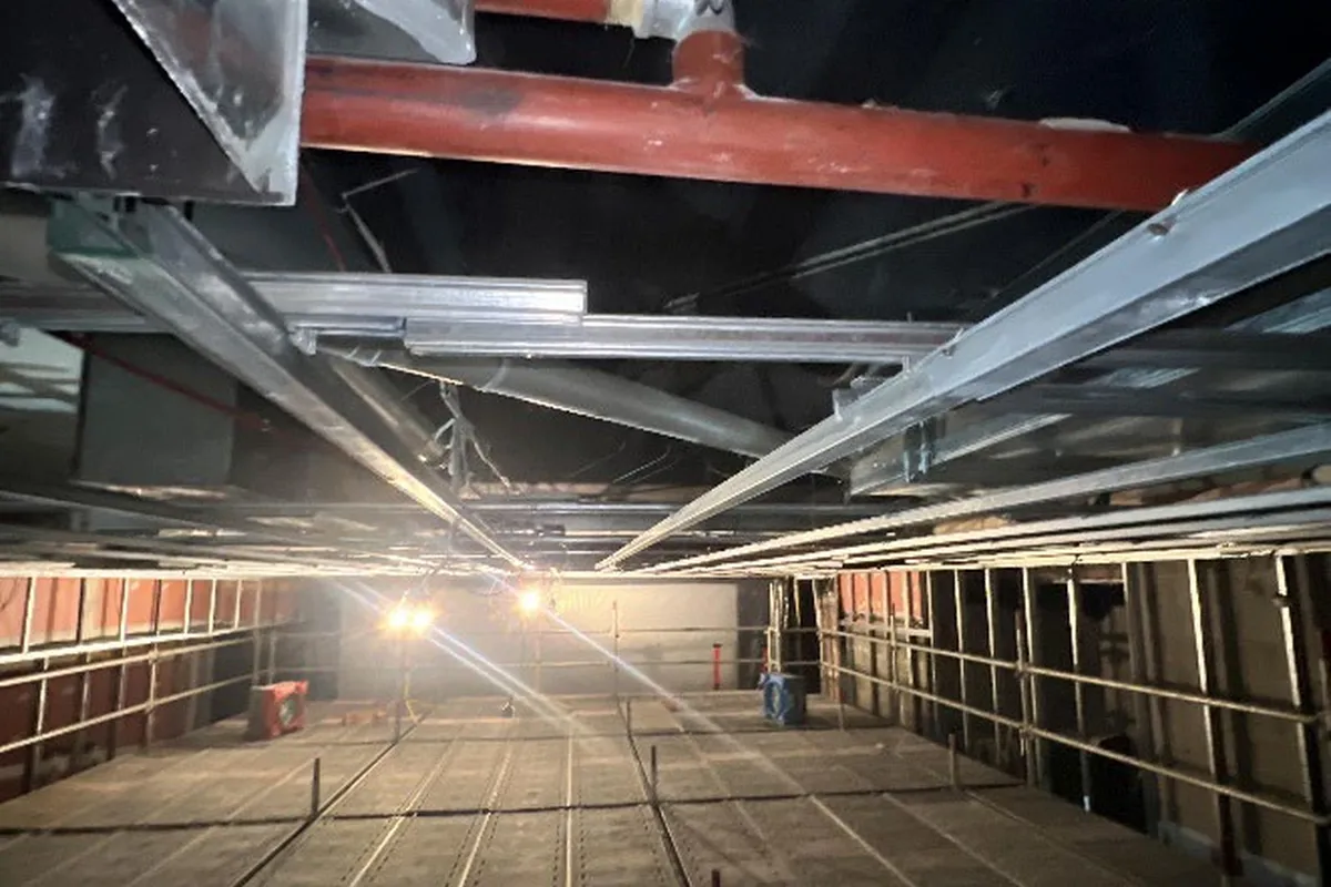 Corridor under restoration with protective covering
